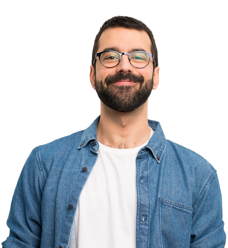 Caucasian male, smiling, wearing black rimmed glasses and an unbuttoned blue jean shirt and white t shirt